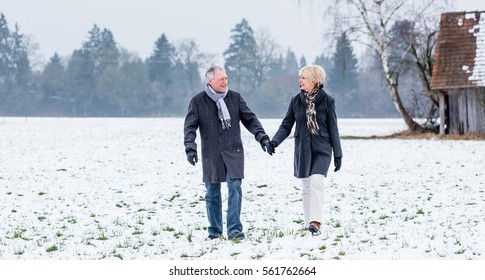 Senior Couple Having Walk In Winter