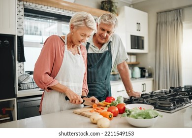 Senior couple, healthy food and cooking lunch together in Australia kitchen at home. Happy woman, hungry man and retirement people cut vegetables for nutrition diet, wellness and vegan dinner meal - Shutterstock ID 2211549153