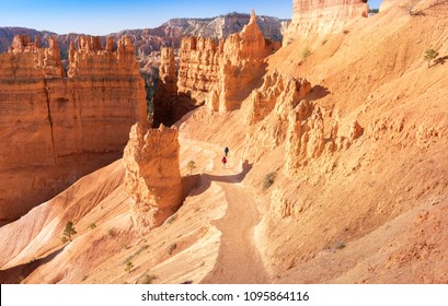 Senior Couple Hiking In Bryce Canyon National Park