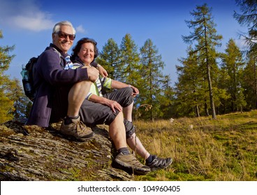 Senior Couple Hiking In The Nature