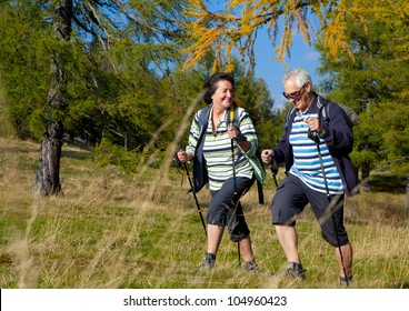 Senior Couple Hiking In The Nature