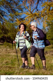 Senior Couple Hiking In The Nature