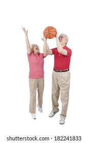 	Senior Couple Holding Basketball	