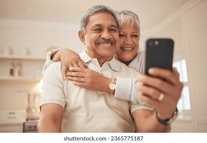 Senior couple, home and smile with smartphone for video call, mobile streaming and scroll on social media in retirement. Happy old man, woman and hug with phone for selfie, reading news app and relax - Powered by Shutterstock