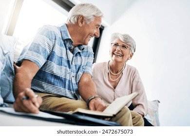 Senior couple, home and smile with writing on document in sofa for grocery or shopping list for household. People, planning and budgeting, saving and notebook for insurance and asset management - Powered by Shutterstock