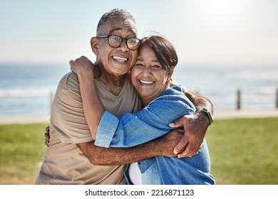 Senior couple, hug and happy on vacation being romantic, smile or bonding to celebrate marriage, anniversary or beach. Elderly man, mature woman or embrace for relationship, relax or romantic travel - Powered by Shutterstock