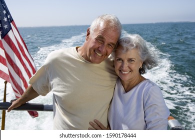 Senior couple hugging on boat - Powered by Shutterstock