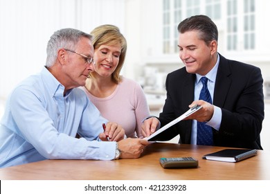 Senior Couple With Insurance Agent.