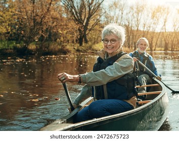 Senior couple, kayak and rowing in river for holiday, travel or summer vacation in water outdoor together. Man, woman and canoe boat in lake on transport for adventure, exercise and happy in nature - Powered by Shutterstock