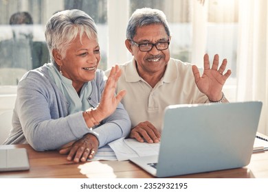 Senior couple, laptop and hello in video call, virtual meeting or communication together at home. Happy mature man or woman waving or talking on computer in online conversation or discussion in house - Powered by Shutterstock