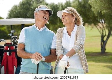 Senior couple laughing on golf course - Powered by Shutterstock