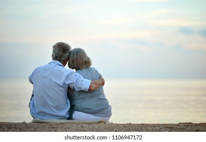 Senior couple looking a sea