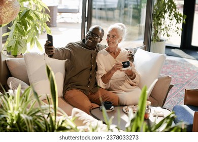 Senior couple making selfie on smartphone - Powered by Shutterstock