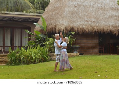 Senior Couple Near Hotel 