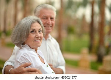 Senior Couple Near Hotel Resort