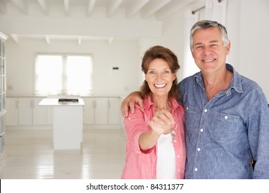 Senior Couple In New Home