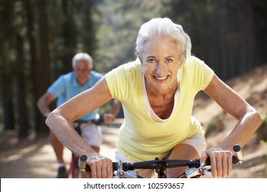 Senior Couple On Country Bike Ride