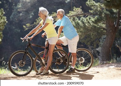 Senior Couple On Country Bike Ride