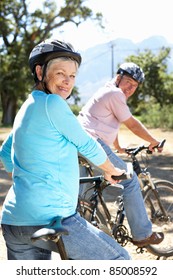 Senior Couple On Country Bike Ride