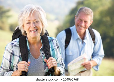 Senior couple on country walk - Powered by Shutterstock