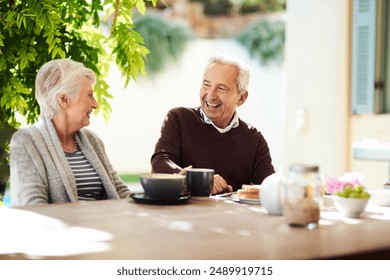 Senior couple, outside and breakfast together in home garden, bonding or eating for food and coffee. Nature, happy or married people in house for brunch in retirement, ingredient or support with love - Powered by Shutterstock