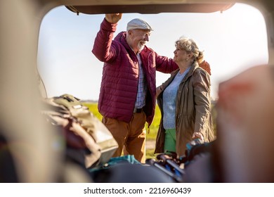 Senior couple packing a car
 - Powered by Shutterstock