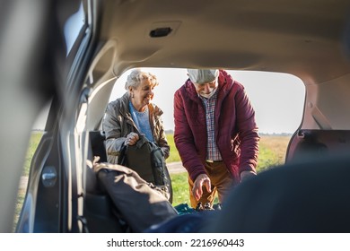 Senior couple packing a car
 - Powered by Shutterstock