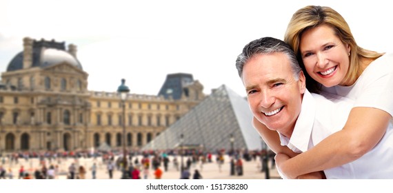 Senior Couple In Paris. Tourism And Traveling Background.