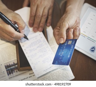 Senior Couple Paying Bill Concept