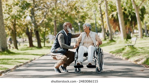 Senior, couple and people with disability in park for fresh air, walking and enjoyment of retirement or wellness with love. Man, woman and outdoor in garden for bonding, together and wheelchair. - Powered by Shutterstock