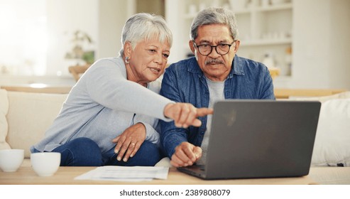 Senior, couple and planning on laptop in living room with document for finances, investment or retirement. Elderly man, woman and pointing by technology for online banking, account balance or savings - Powered by Shutterstock