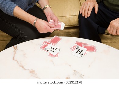 Senior Couple Playing Cards