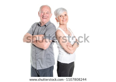 Senior couple posing on studio white background arm cross
