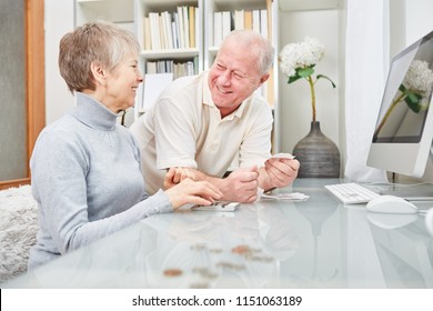 Senior Couple Of Retirees  Doing Accounting At Home