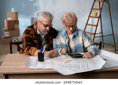 Senior Couple Reviewing Renovation Plans - Powered by Shutterstock