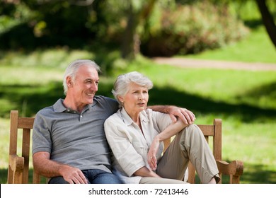 Senior Couple Sitting On A Bench