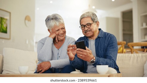 Senior couple, smartphone and social media with smile, conversation and living room sofa. Grandparents, technology and communication with family, man and woman in retirement, happy and connection - Powered by Shutterstock