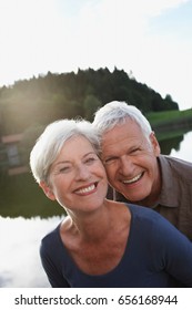 Senior Couple Smiling To Camera