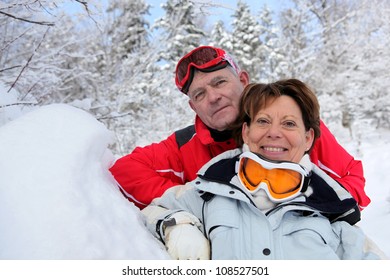 Senior Couple In The Snow