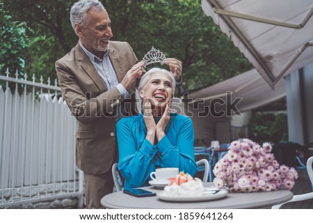 Senior couple spending time in a cafè