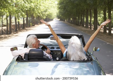 Senior Couple In Sports Car