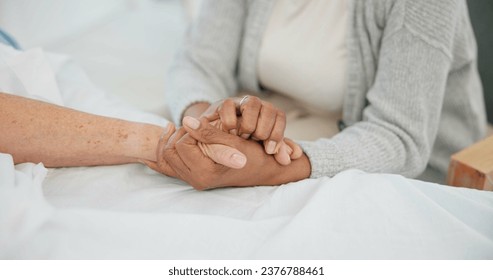 Senior couple, support and holding hands in hospital with love and care at clinic. Elderly patient, kindness and marriage with trust and healthcare with medical help and homecare with empathy - Powered by Shutterstock