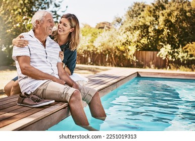 Senior couple, swimming pool and relax happiness on travel holiday or summer vacation outdoor. Elderly man, woman smile and conversation, happy bonding and calm peace for support or relaxing together - Powered by Shutterstock