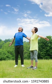 Senior Couple Taking A Deep Breath