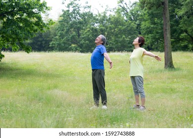 Senior Couple Taking A Deep Breath