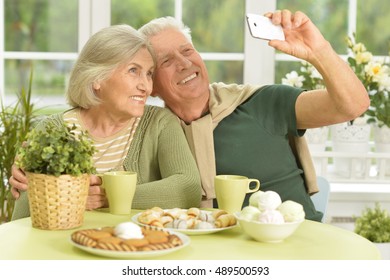 Senior Couple Taking Selfie 