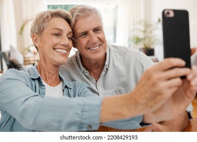 Senior Couple Taking Selfie With Phone, Smile In Love With 5g And Technology For Social Media In Marriage At House. Happy, Married And Smiling Man And Woman Streaming, Communication Or Video Call