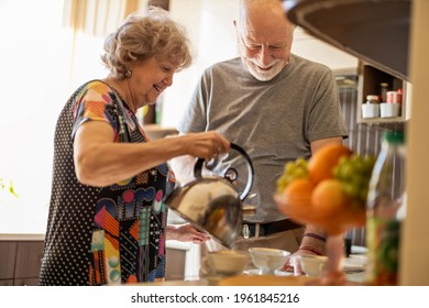 Senior couple together in their kitchen at home
 - Powered by Shutterstock