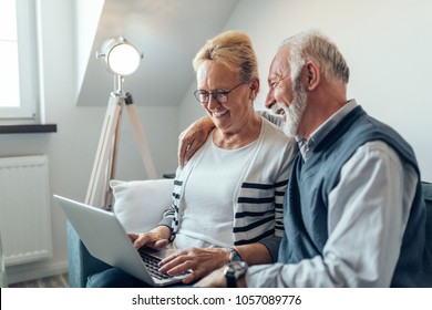 Senior Couple Using A Laptop Computer