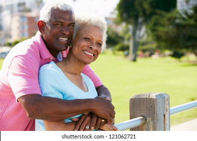 Senior Couple Walking In Park Together - Powered by Shutterstock